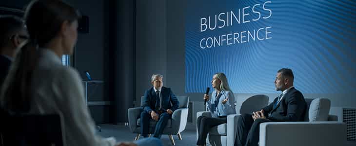 A small group meeting of professionals on stage
